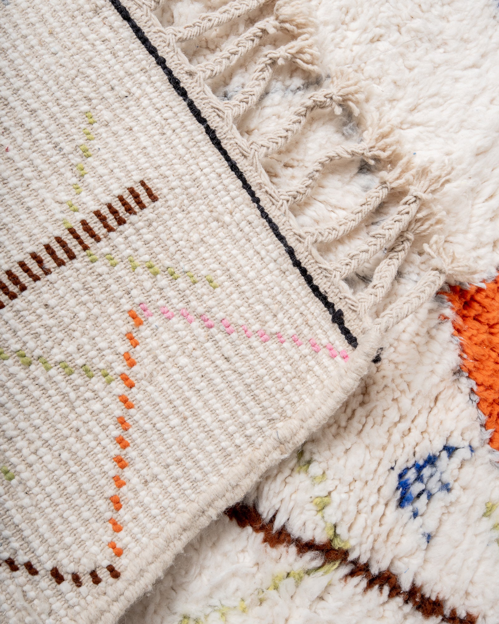 Modern, designer, handcrafted Berber rug from Morocco. Beniourain carpet with beautiful colours and patterns and fluffy wool texture.